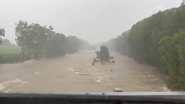 Flooding of the Pioneer River on the bridge heading towards Finch Hatton