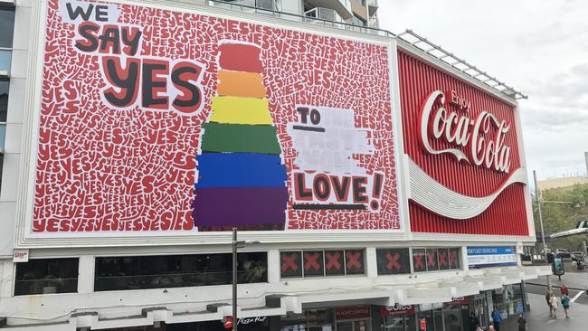 The Coke sign in Kings Cross was lit up in rainbow colours until the marriage equality vote results were in.