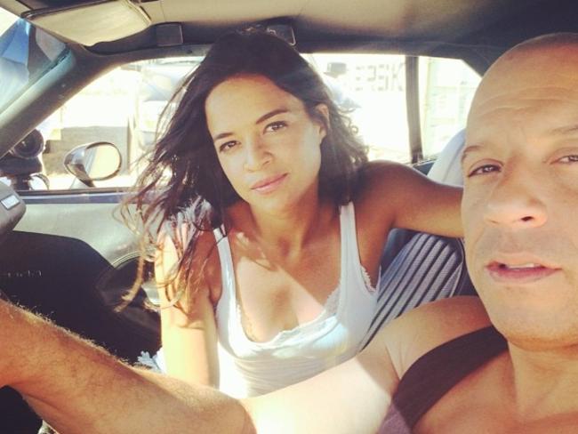 Actors Michelle Rodriguez and Vin Diesel in a candid photo from the set of Fast & Furious 7. Picture: Instagram