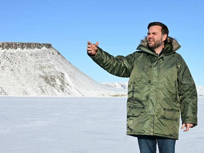 (FILES) US Vice President JD Vance tours the US military's Pituffik Space Base in Greenland on March 28, 2025. Greenlanders head to the polls on April 1, 2025, for local elections held under the shadow of US President Donald Trump's threat to annex the autonomous Danish territory. (Photo by Jim WATSON / POOL / AFP)
