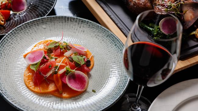 Order the degustation at InterContinental Sanctuary Cove Resort’s Fireplace Restaurant.