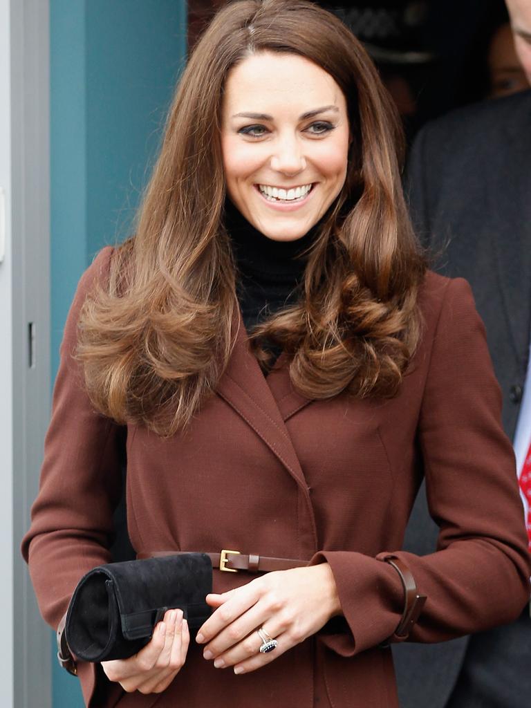 She wore the same brown coat in February 2012 during a visit to The Brink, an alcohol-free bar in Liverpool. Picture: Christopher Furlong/Getty Images.