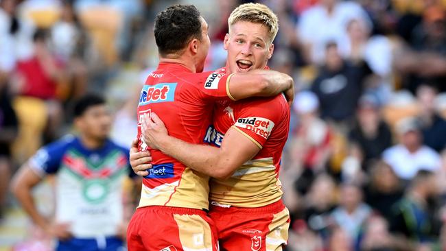 BRISBANE, AUSTRALIA - SEPTEMBER 02: Max Plath of the Dolphins celebrates with team mate Sean O'Sullivan after scoring a try during the round 27 NRL match between the Dolphins and New Zealand Warriors at Suncorp Stadium on September 02, 2023 in Brisbane, Australia. (Photo by Bradley Kanaris/Getty Images)