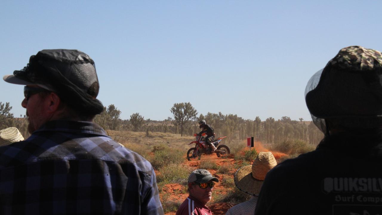 The 2025 Finke Desert Race has begun, with hundreds of punters lining the track south of Alice Springs to catch the action. Picture: Gera Kazakov