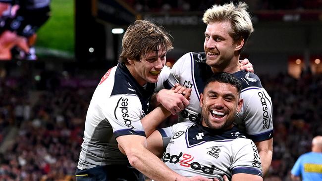 BRISBANE, AUSTRALIA - AUGUST 19: David Nofoaluma of the Storm celebrates scoring a try during the round 23 NRL match between the Brisbane Broncos and the Melbourne Storm at Suncorp Stadium, on August 19, 2022, in Brisbane, Australia. (Photo by Bradley Kanaris/Getty Images)