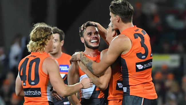 GWS players celebrate their win against Port Adelaide. Picture: Getty Images