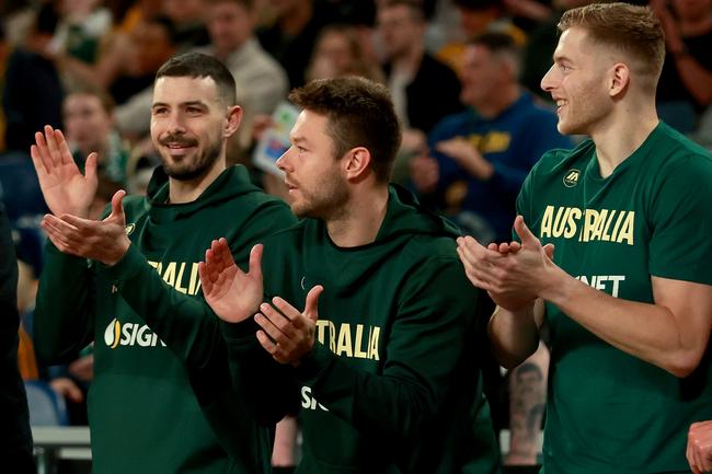 Melbourne United trio Chris Goulding, Matthew Dellavedova and Jack White in the green and gold on their home floor at John Cain Arena. Picture: Getty Images