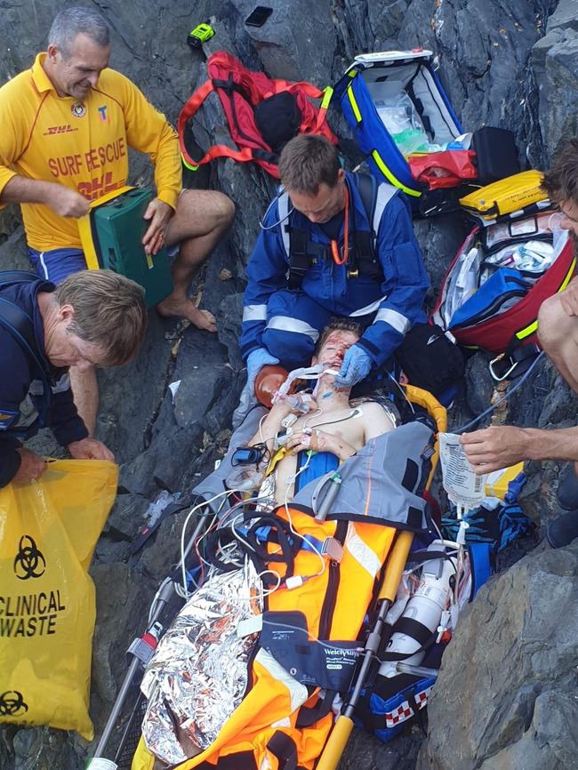 Rescue crews attend to Connor after his fall. Picture: Supplied