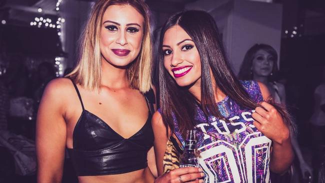 These two clubbers get among the action at the Vintage Superclub at Room 680 on November 30, 2013. Picture: Room 680 Facebook page.