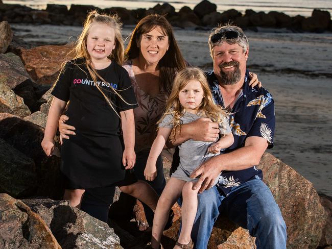 Margaret (first name only) is a foster mum with her partner Craig, pictured with adopted girls Holly 6 and Havana 4, at Office Beach in Wallaroo, on November 16th, 2022.Picture: Tom Huntley