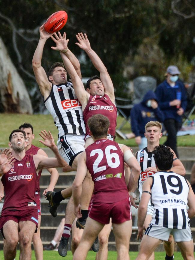 Payneham’s Liam Davis and Princes’ Adam Perryman fly during the grand final at Richmond Oval. Picture: Brenton Edwards