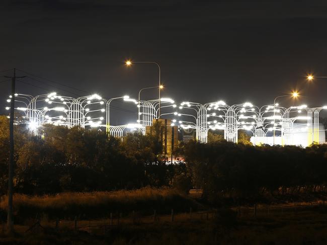 The controversial lights at the M1 in Yatala. Picture: AAP Image/Josh Woning.