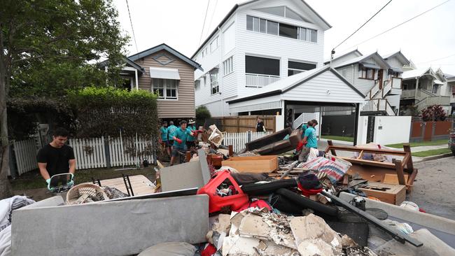Cleaning up in Vincent St, Auchenflower. Picture: Annette Dew
