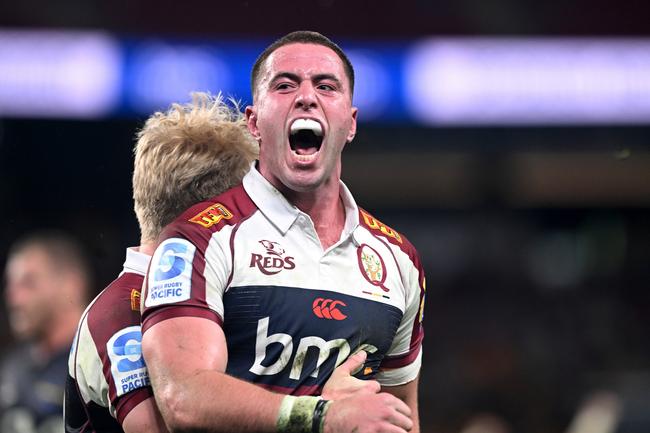 Joe Brial of the Reds celebrates after scoring a try during the round 15 Super Rugby Pacific match between Queensland Reds and Hurricanes at Suncorp Stadium, on May 23, 2025, in Brisbane, Australia. Photo by Bradley Kanaris/Getty Images.