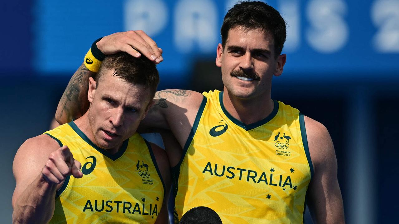 Australia's forward Tom Wickham (L) celebrates scoring his team's in the men's pool B field hockey match between New Zealand and Australia during the Paris 2024 Olympic Games, August 1, 2024. Picture: Miguel MEDINA / AFP.