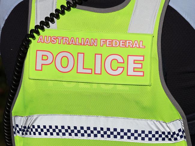 Mystery as federal police swarm Adelaide Airport