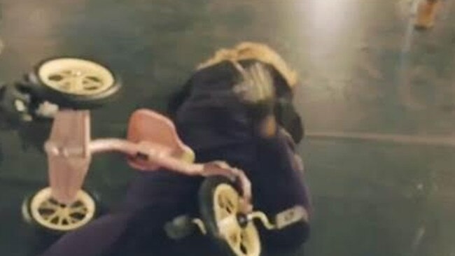 Huge superstar Madonna and her tiny bike which was shot before she arrived in Australia.