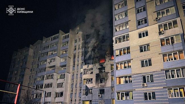 Emergency services at a block of flats near Kyiv after the Russian drone attacks on Friday. Picture: EPA/The Times