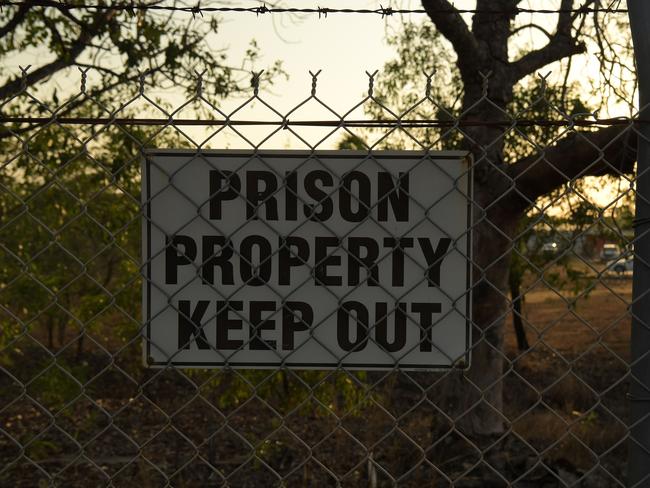 Prison signs hang from the fence around Don Dale Youth Detention Centre. Picture: (A)manda Parkinson