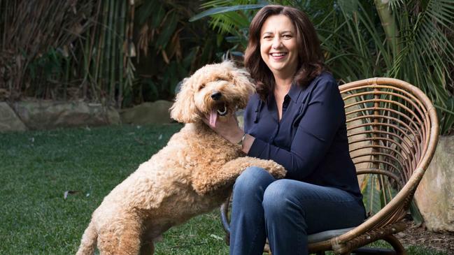 Premier Annastacia Palaszczuk with dog Winton in her backyard. Picture: David Kelly