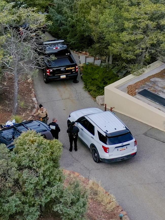 Santa Fe County deputies outside the house belonging to actor Gene Hackman and his wife Betsy Arakawa. Picture: Roberto E. Rosales