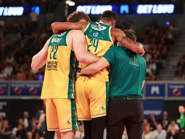 Marcus Lee is helped from the floor during game three of last season’s grand final. Picture: Getty Images