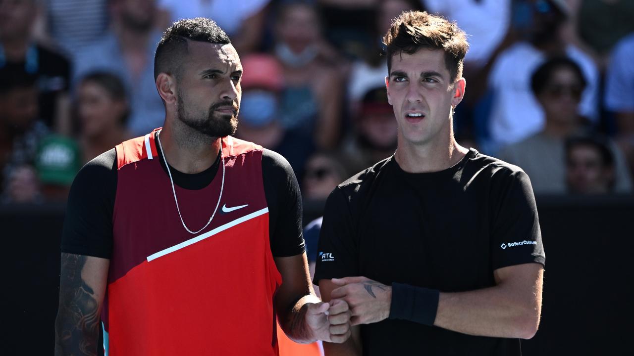 MELBOURNE, AUSTRALIA - JANUARY 25: Thanasi Kokkinakis (R) of Australia and Nick Kyrgios of Australia celebrate a point in their Men's Doubles Quarterfinals match against Tim Puetz of Germany and Michael Venus of New Zealand during day nine of the 2022 Australian Open at Melbourne Park on January 25, 2022 in Melbourne, Australia. (Photo by Quinn Rooney/Getty Images)