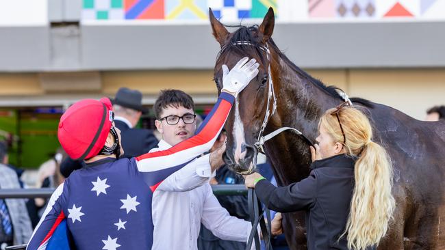 Jason Holder gives Air Assault a pat after the Port Adelaide Guineas. Picture: Makoto Kaneko