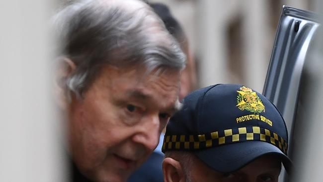 George Pell departs the Supreme Court of Victoria after his appeal was dismissed. Picture: James Ross/AAP