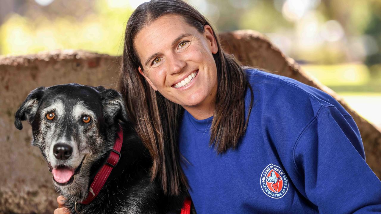 AFLW star and RSPCA SA ambassador Chelsea Randall and her dog Koda. Picture: Russell Millard Photography