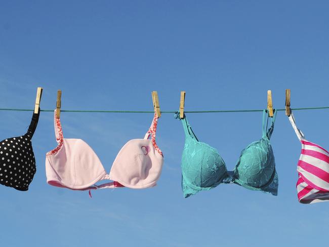 Four colorful Bras on Clothesline