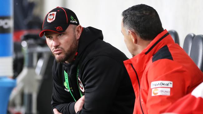 Dean Young speaks with Shane Flanagan. Neither are expected to be at the Dragons next season. Picture: Mark Kolbe/Getty Images