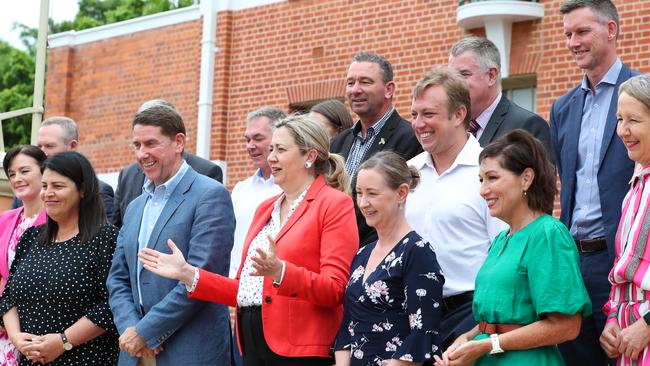 Annastacia Palaszczuk and state cabinet ministers pose for photos on the steps of city hall at Maryborough. Picture Lachie Millard