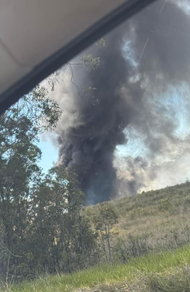 Police and fire crews were called to a fire off of the Old Pacific Hwy in Pimpama around 10.50am on Friday. Photo: Torii Weatherall/Facebook