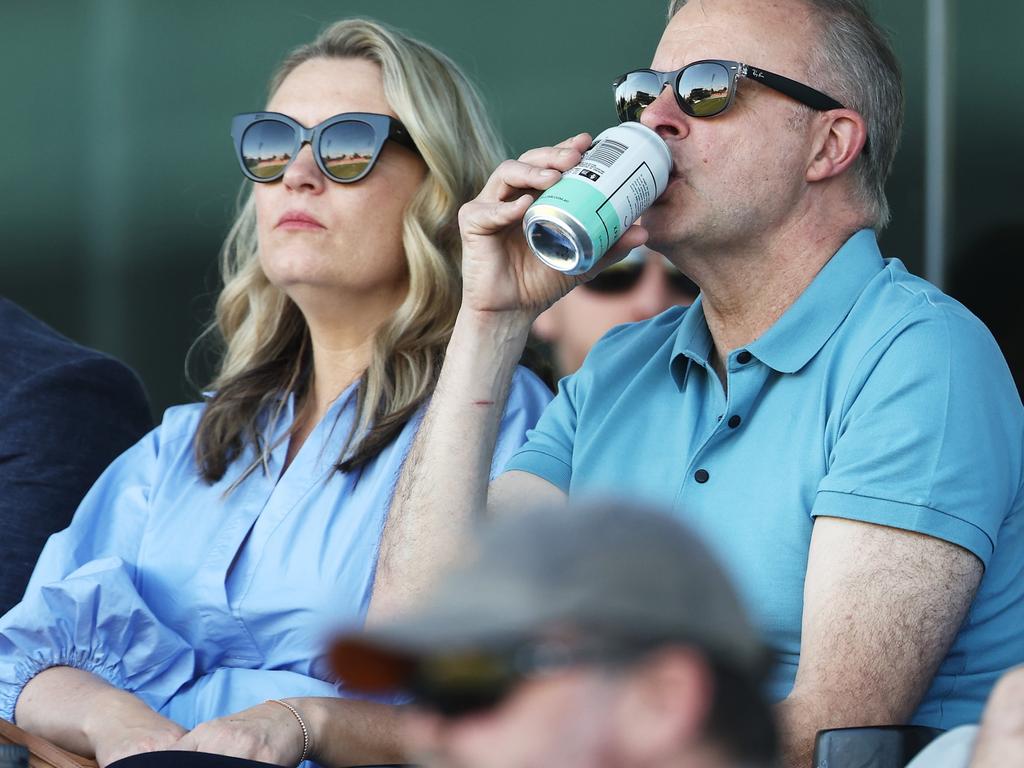 Mr Albanese enjoys a beer as he watches the cricket with partner Jodie Haydon late last year. Picture: Matt King/Getty Images