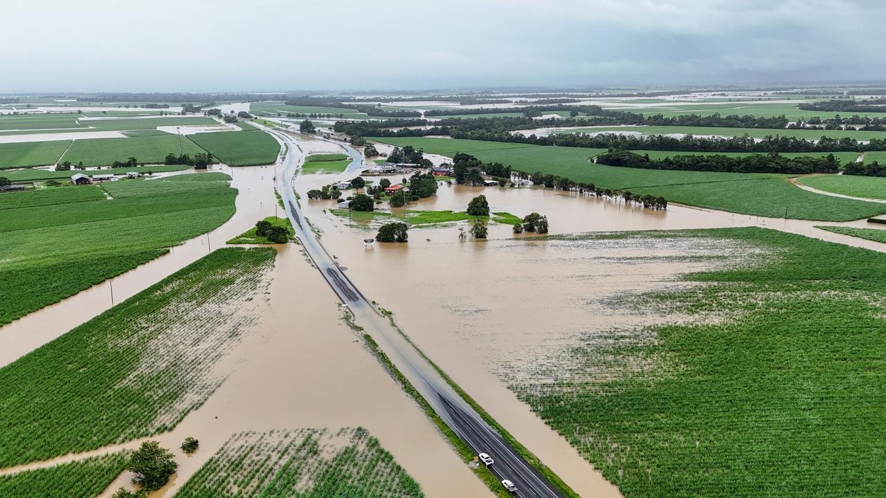 A monsoonal tropical low pressure system has bought devastating widespread flooding to North Queensland and parts of Far North Queensland, with over 700 millimetres of rain recorded in some areas and more wet weather forecast for the region. Flood water covers the Bruce Highway at Euramo, south of the Tully River, the furthest south the Far North Queensland residents can currently travel by road. Picture: Brendan Radke