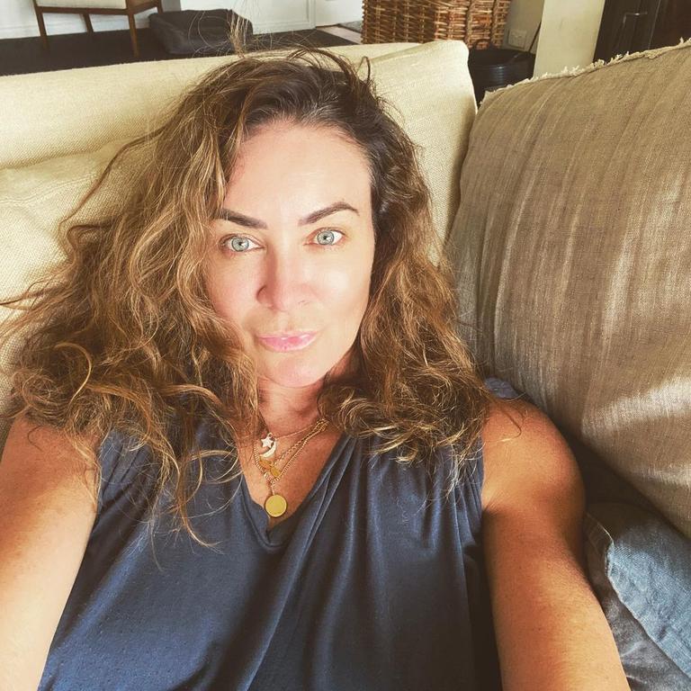 In the photo, the fitness star has ‘beach hair’ and appears to be make-up free. Picture: Instagram/MishBridges