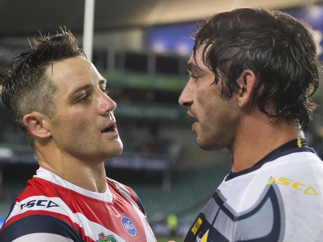 Cooper Cronk of the Roosters and Johnathan Thurston of the Cowboys hug after the match during the Round 21 NRL match between the Sydney Roosters and the North Queensland Cowboys at Allianz Stadium in Sydney, Saturday, August 4, 2018. (AAP Image/Craig Golding) NO ARCHIVING, EDITORIAL USE ONLY