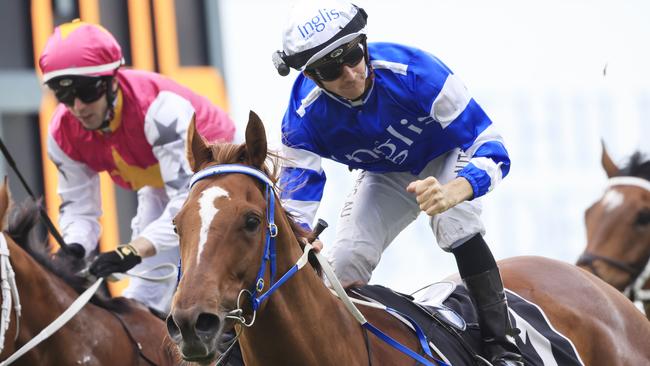 Jason Collett salutes after riding Gytrash to a thrilling win. Picture: Getty Images