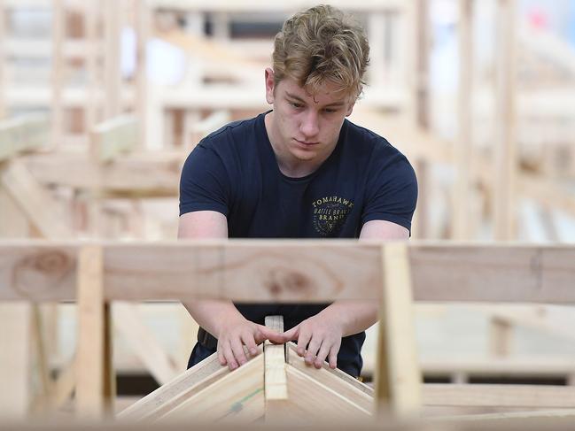 An apprentice carpenter is seen at Holmesglen TAFE Chadstone campus in Melbourne, Monday, May 13, 2017. (AAP Image/Julian Smith) NO ARCHIVING