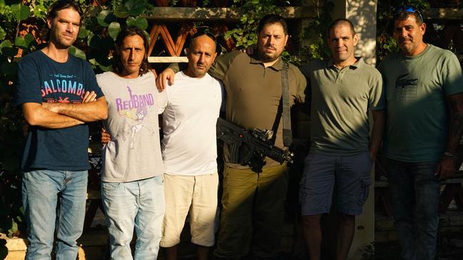 Some members of Mefalsim’s volunteer security force, from left, David Rosenberg, Yarden Reskin, Shaked Porat, Louis Dascal, Eli Levi and Noam Kazaz, in Hertzlia, Israel, this week. Picture: Maya Levin for The Wall Street Journal