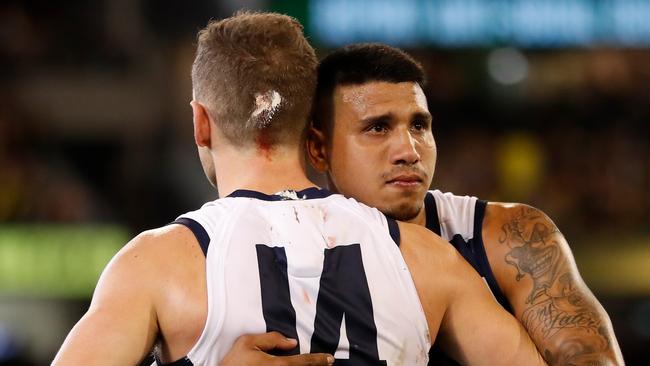 Tim Kelly shares a hug with Joel Selwood after the loss. Pic: Getty Images