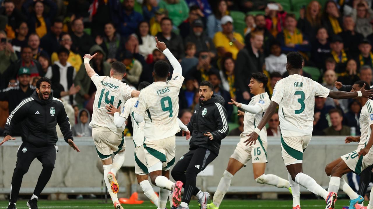 Saudi Arabia players celebrate a goal, which was disallowed. (Photo by Graham Denholm/Getty Images)