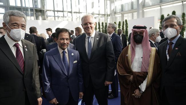 Scott Morrison attends the G20 Official Welcome and Family photo and chats with Sultan Hassanal Bolkiah (ASEAN Chair) and Singapore Prime Minister Lee Hsien Loong in Rome. Picture: Adam Taylor