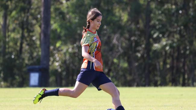 Action during WestMAC's successful Girls Football season.