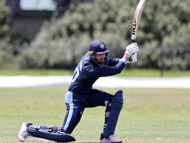 Kew star Matthew Brown splashes out with a cover drive.