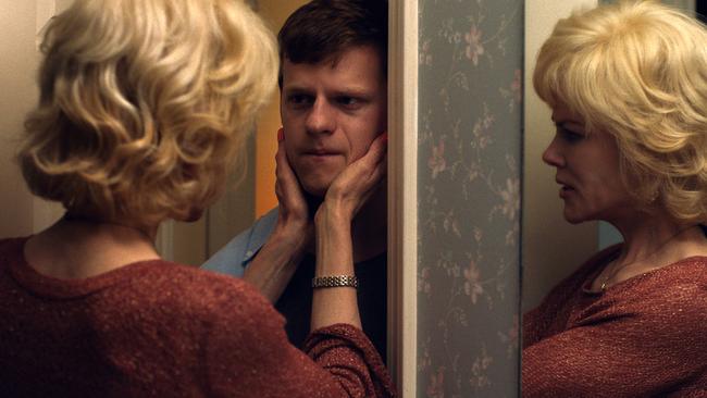 This image released by Focus Features shows Nicole Kidman, left, and Lucas Hedges in a scene from 