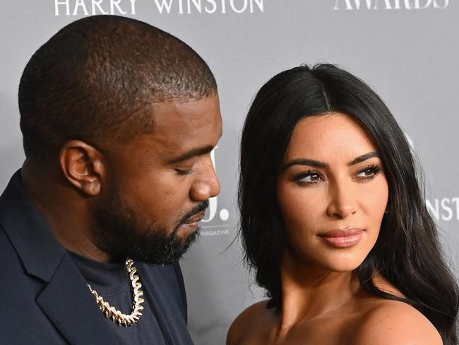 (FILES) In this file photo US media personality Kim Kardashian West (R) and husband US rapper Kanye West attend the WSJ Magazine 2019 Innovator Awards at MOMA on November 6, 2019 in New York City. - Reality TV star Kim Kardashian has filed for divorce from rapper Kanye West after almost seven years of marriage, US media reported February 19.   Kardashian's lawyer Laura Wasser filed papers confirming a split first rumored back in January, when the mega-celebrity couple were reported to be living separately, Fox News said. (Photo by Angela Weiss / AFP)