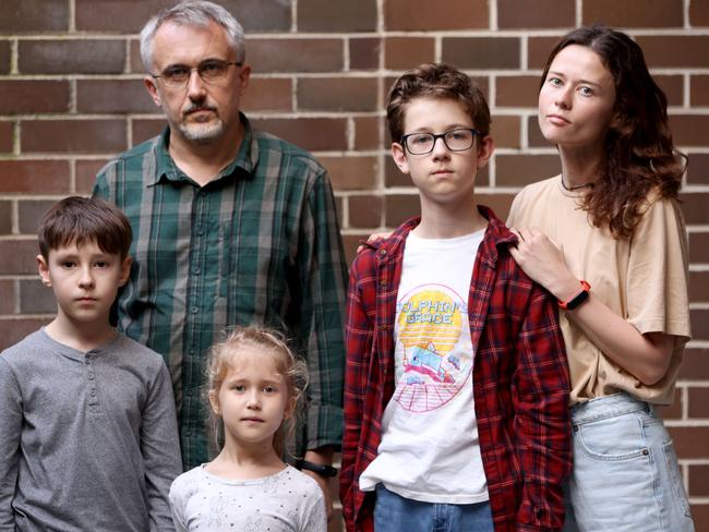 Kyrylo Prokopchuk (left) with his Sydney carers Olga and Dmytro Bablinyuk, and their children Egor Grydasov, 12, and Keira Bablinyuk, 6. Picture: Damian Shaw