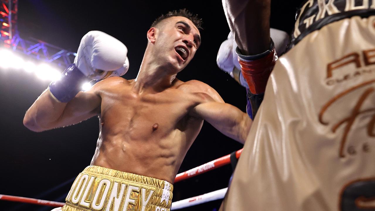 CATOOSA, OKLAHOMA - AUGUST 14: Jason Moloney (L) and Joshua Greer Jr (R) exchange punches during their fight at Hard Rock Hotel &amp; Casino Tulsa on August 14, 2021 in Catoosa, Oklahoma. (Photo by Mikey Williams/Top Rank Inc via Getty Images)